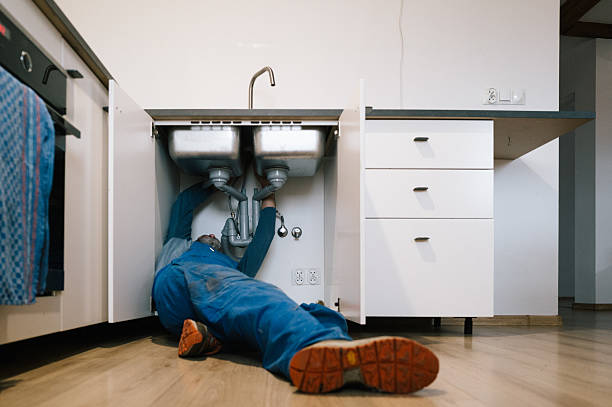 Professional Plumbing technician working in Wallburg, NC